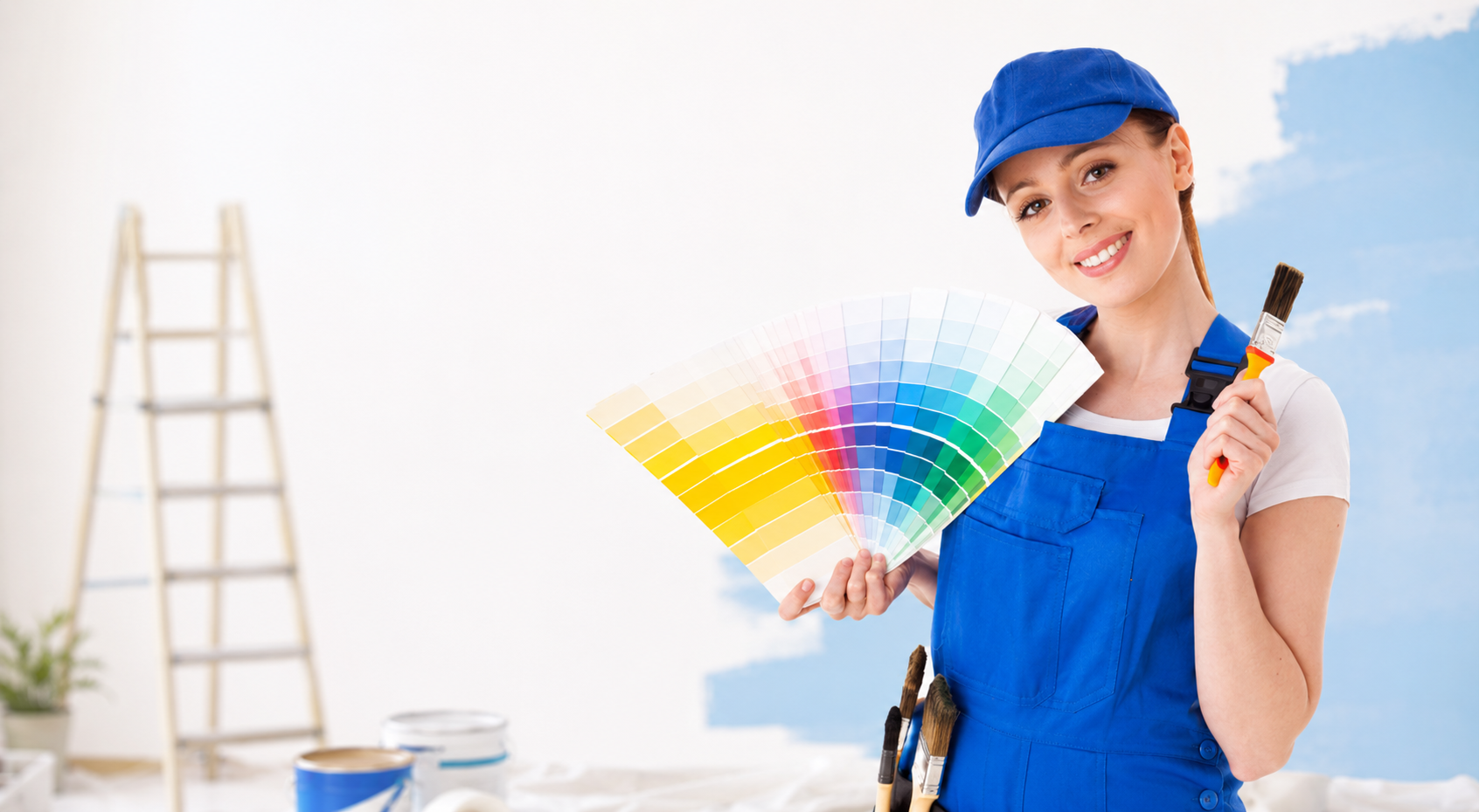 Professional painter with color swatches — Patch Plus Paint, North Dallas