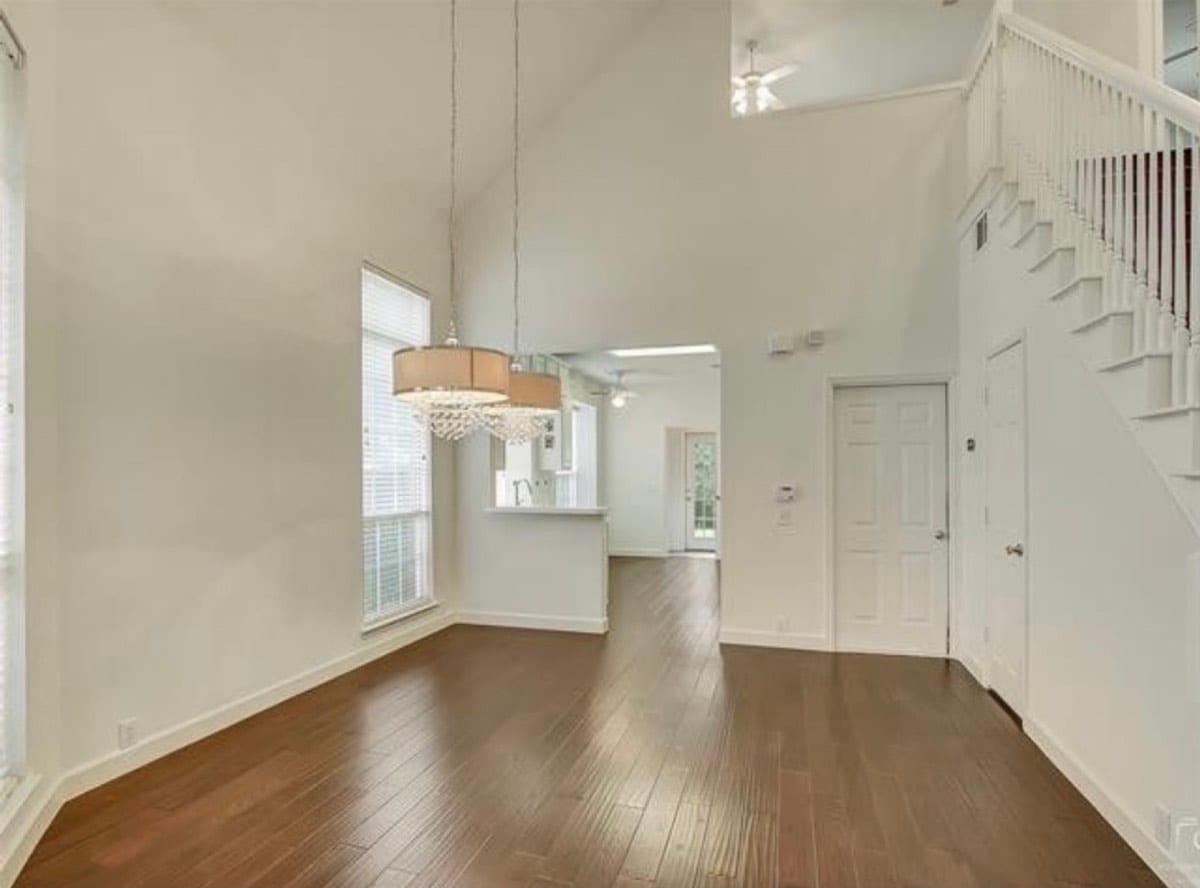 Two-story living and dining space after interior painting
