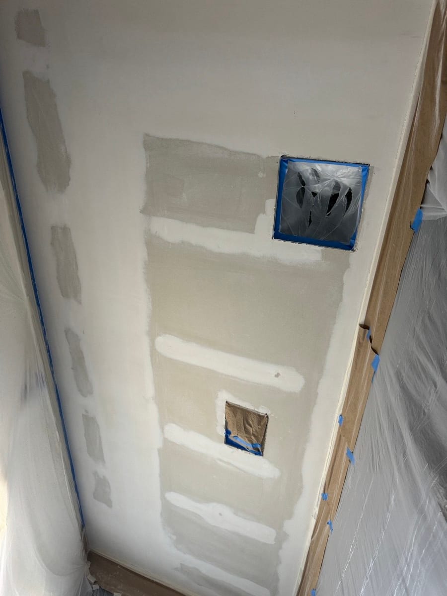 Ceiling taped, bedded, and masked off, ready for popcorn texture
