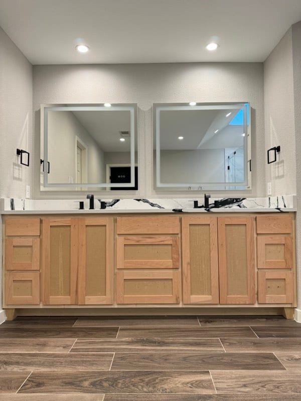 Double bathroom vanity in bare unfinished wood before painting